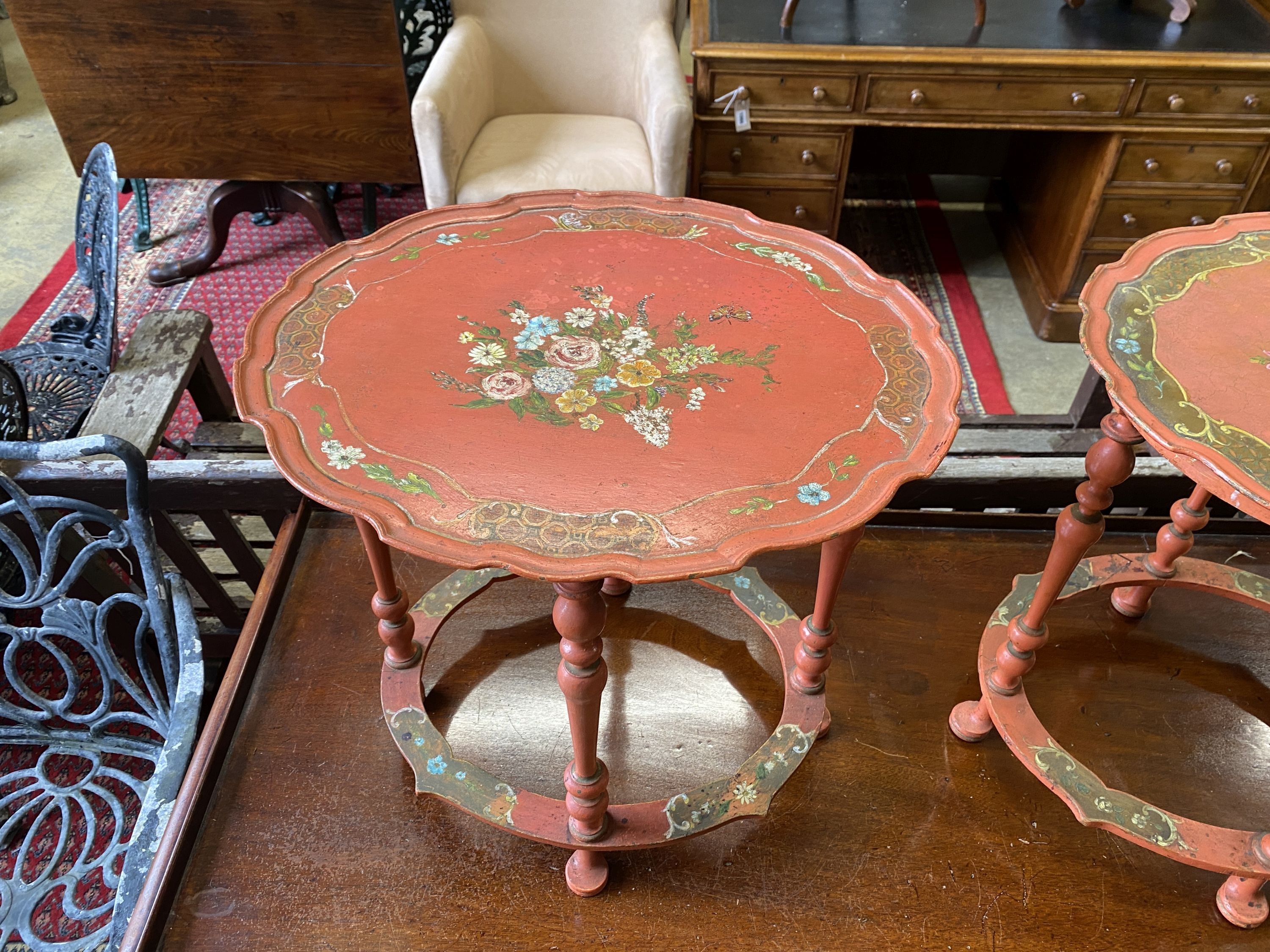 A pair of oval floral painted occasional tables, width 49cm, depth 42cm, height 49cm